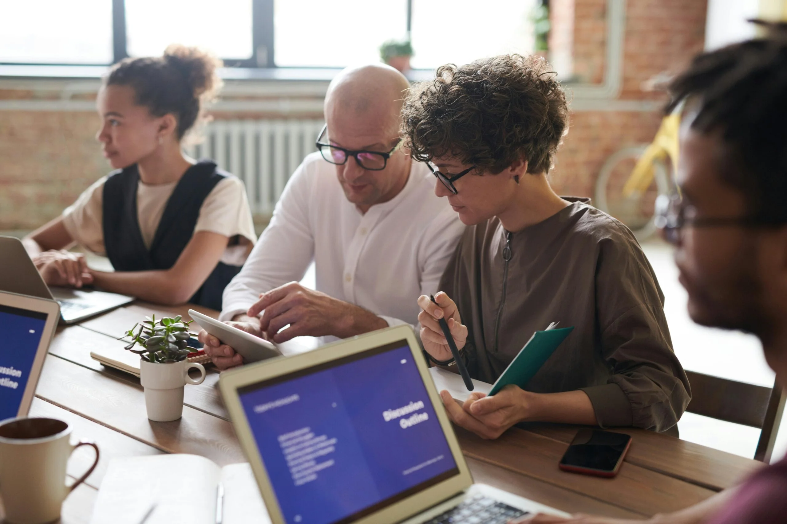 Team discuss workflow and business things